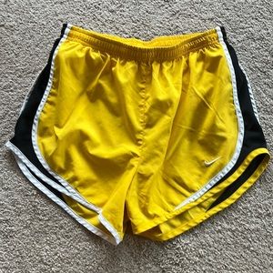 Nike tempo shorts. Yellow with black piping. Great condition.